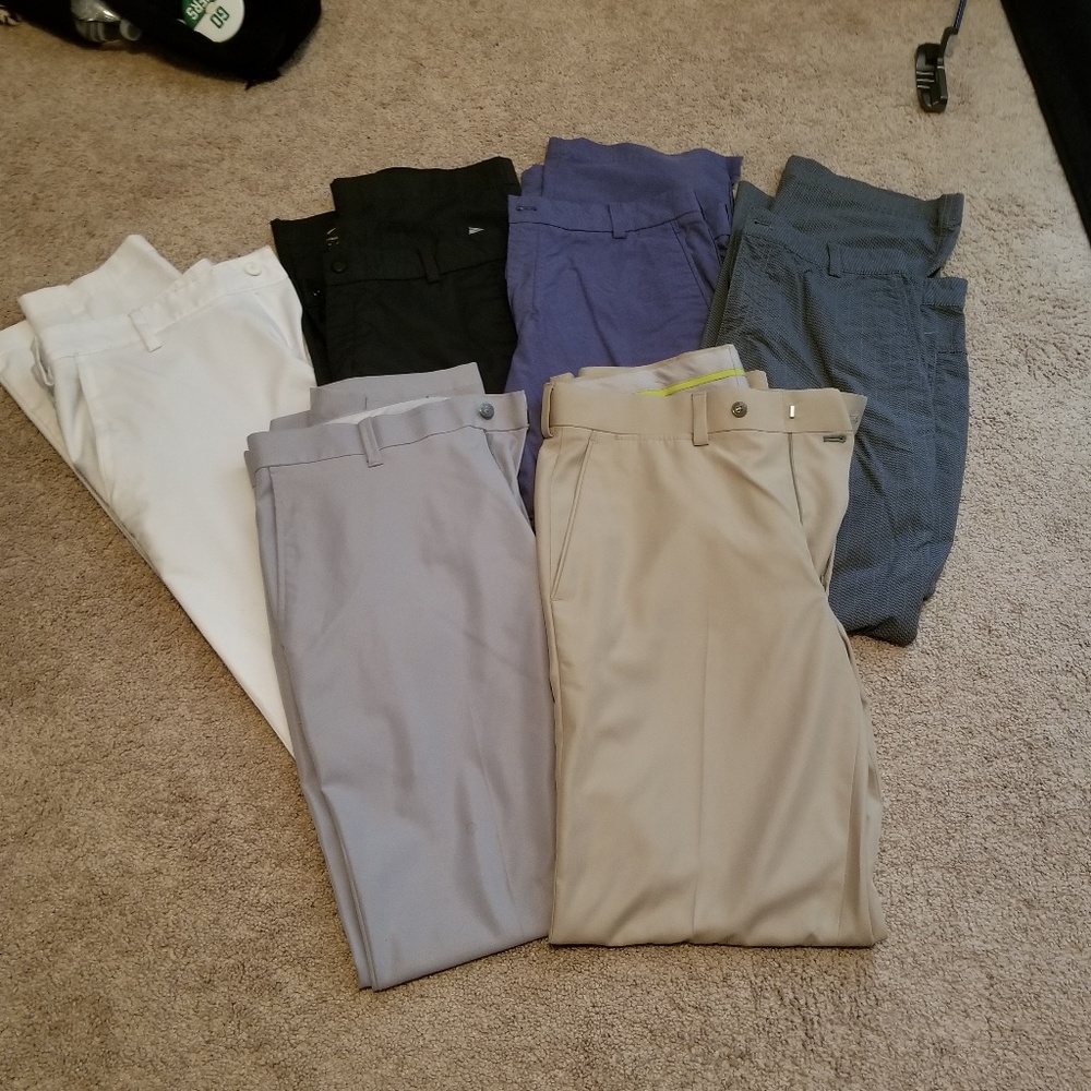 6 pair of golf pants and 1 golf shorts